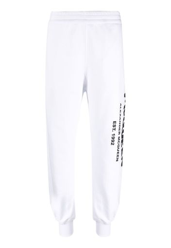 Alexander McQueen logo-print tapered track pants - Weiß