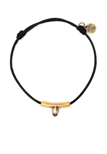 Alexander McQueen logo-engraved skull charm bracelet - Schwarz