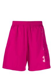 Alexander McQueen logo-print swim shorts - Rosa