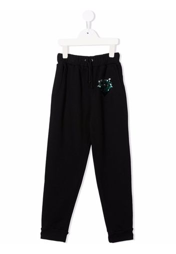 Andorine sequin-embroidered track pants - Schwarz