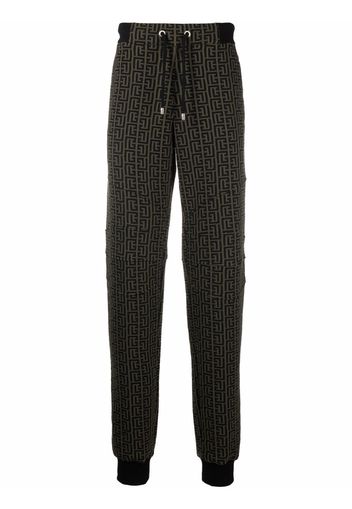 Balmain Jogginghose mit Monogramm-Print - Braun