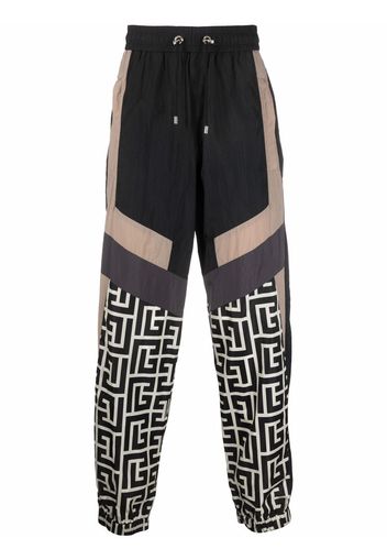 Balmain colour-blocked monogram track pants - Schwarz