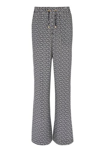 Balmain Weite Hose mit Monogramm-Print - Weiß