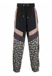 Balmain colour-blocked monogram track pants - Schwarz