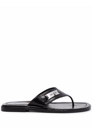 BY FAR Piel Flip-Flops - Schwarz