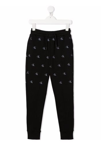 Calvin Klein Kids all-over logo-print track pants - Schwarz