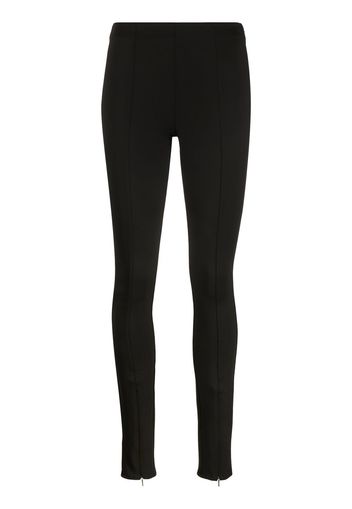 Calvin Klein logo-embroidered cuff-zip leggings - Schwarz