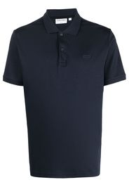 Calvin Klein logo-patch cotton polo shirt - Blau