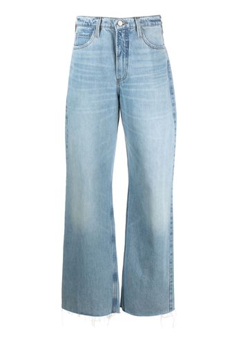 FRAME wide-leg washed denim trousers - Blau