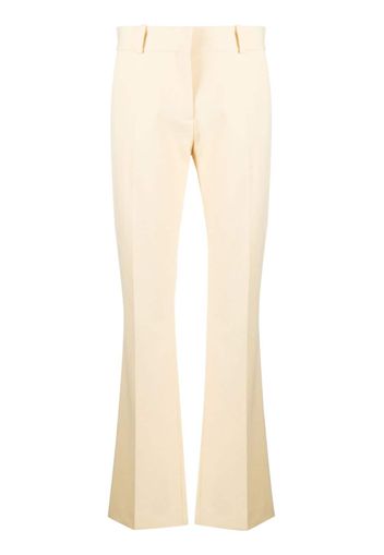 FRAME Le Mini Boot flared trousers - Gelb