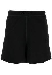 GANNI logo-patch short shorts - Schwarz