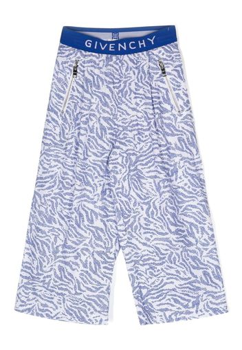 Givenchy Kids all-over print trousers - Blau