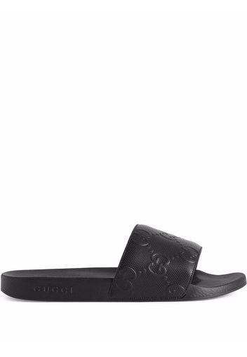 Gucci GG-embossed slides - Schwarz