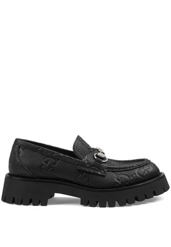 Gucci GG logo-debossed leather lug loafers - Schwarz