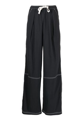 izzue drawstring-waist wide-leg trousers - Schwarz