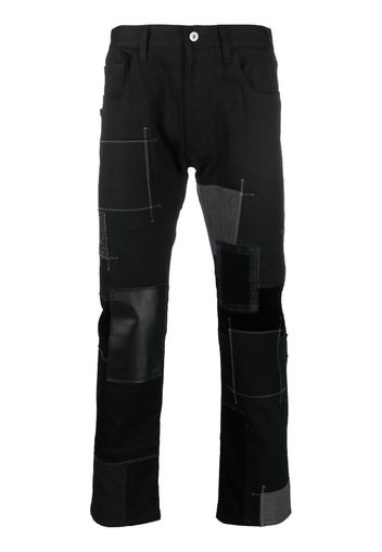 Junya Watanabe MAN patchwork cotton-leather jeans - Schwarz