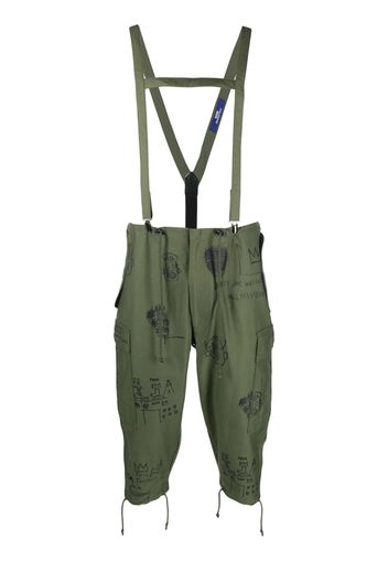 Junya Watanabe MAN graphic-print suspender cropped trousers - Grün