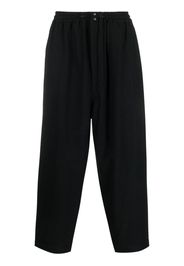 Junya Watanabe MAN wool drawstring-waist cropped trousers - Schwarz