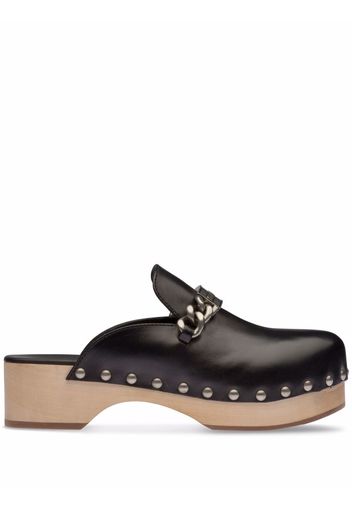 Miu Miu Clogs mit Nieten - Schwarz