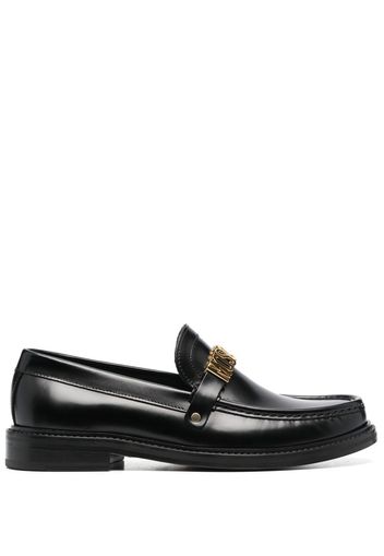 Moschino embossed-logo loafers - Schwarz