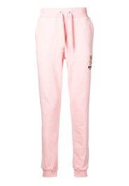 Moschino logo-print track trousers - Rosa