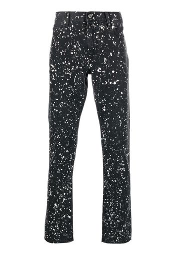 Off-White Diag-stripe paint-splatter skinny jeans - Schwarz