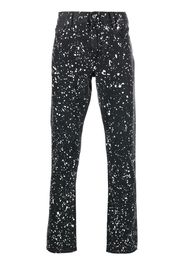 Off-White Diag-stripe paint-splatter skinny jeans - Schwarz