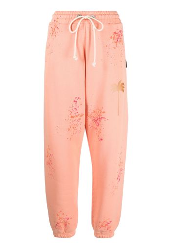 Palm Angels PXP paint-splatter track pants - Orange