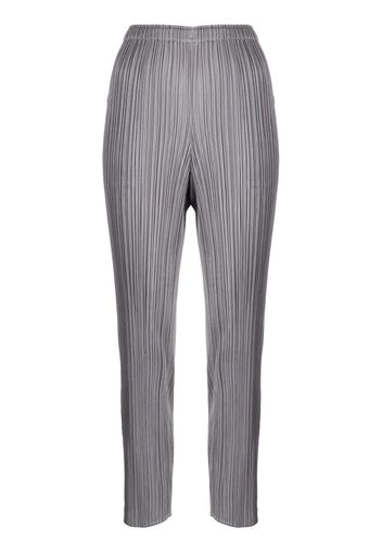 Pleats Please Issey Miyake slim-cut micro-pleated trousers - Grau