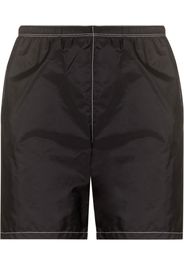 Prada logo-plaque swim shorts - Schwarz