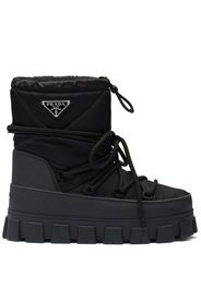 Prada Schneestiefel mit Logo-Schild - Schwarz