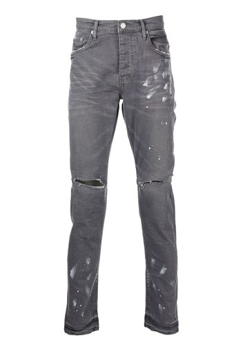 Purple Brand Schmale Distressed-Jeans mit Farbklecksen - Grau