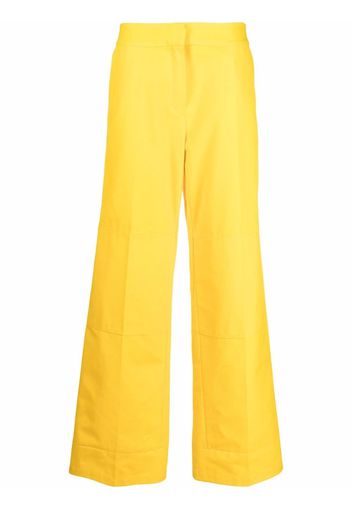 Raf Simons straight-leg logo-patch trousers - Gelb