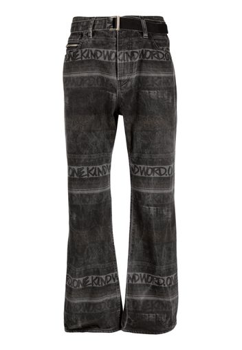 sacai logo-pattern denim jeans - Schwarz