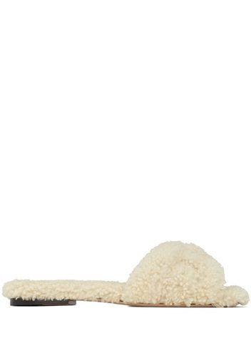 Saint Laurent Pantoletten mit Shearling - Nude