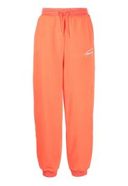 Tommy Jeans logo-embroidered track pants - Orange