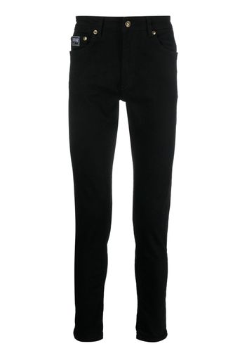 Versace Jeans Couture logo-patch cotton trousers - Schwarz