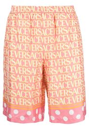 Versace Versace Allover logo-print silk shorts - Rosa