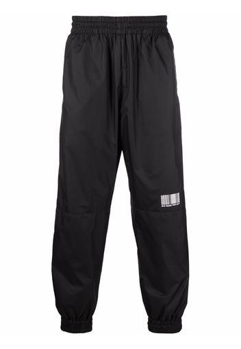 VTMNTS barcode-print track pants - Schwarz