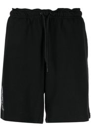 Yohji Yamamoto logo-print cotton shorts - Schwarz