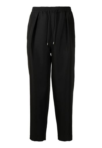 Yoshiokubo Tapered-Hose mit Stretchbund - Schwarz