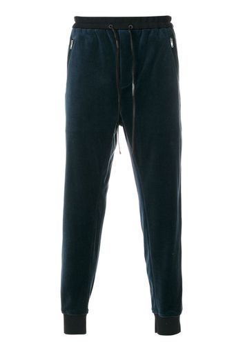 Pantaloni sportivi con cavallo basso