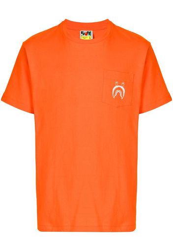 smiley face T-shirt
