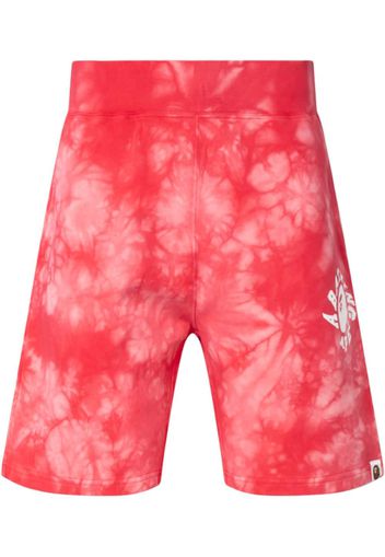 A BATHING APE® tie-dye track shorts - Rosso