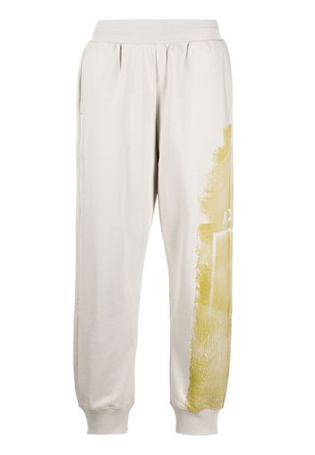 A-COLD-WALL* graphic-print cotton joggers - Toni neutri