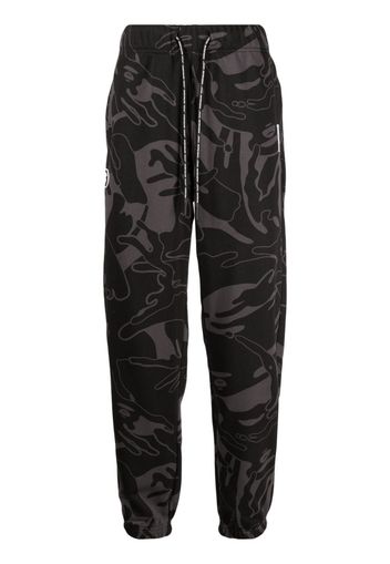 AAPE BY *A BATHING APE® graphic-print tapered trousers - Nero