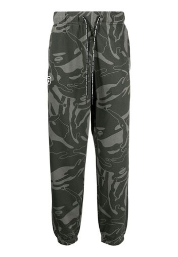 AAPE BY *A BATHING APE® graphic-print tapered trousers - Verde