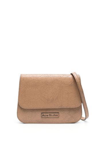 Acne Studios Platt cracked-effect leather crossbody bag - Toni neutri