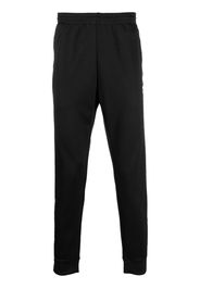 adidas embroidered-logo tapered track pants - Nero