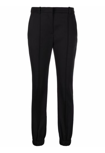 Alexander McQueen elasticated-ankle tailored trousers - Nero